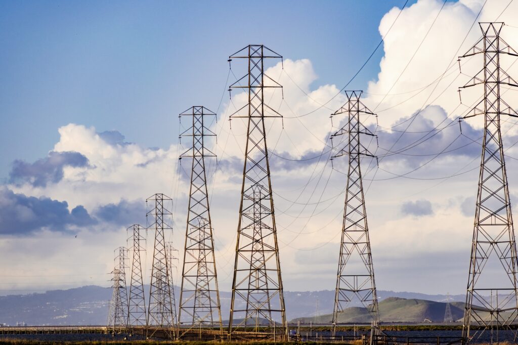 energy and utilities: High voltage electricity power lines and transmission towers