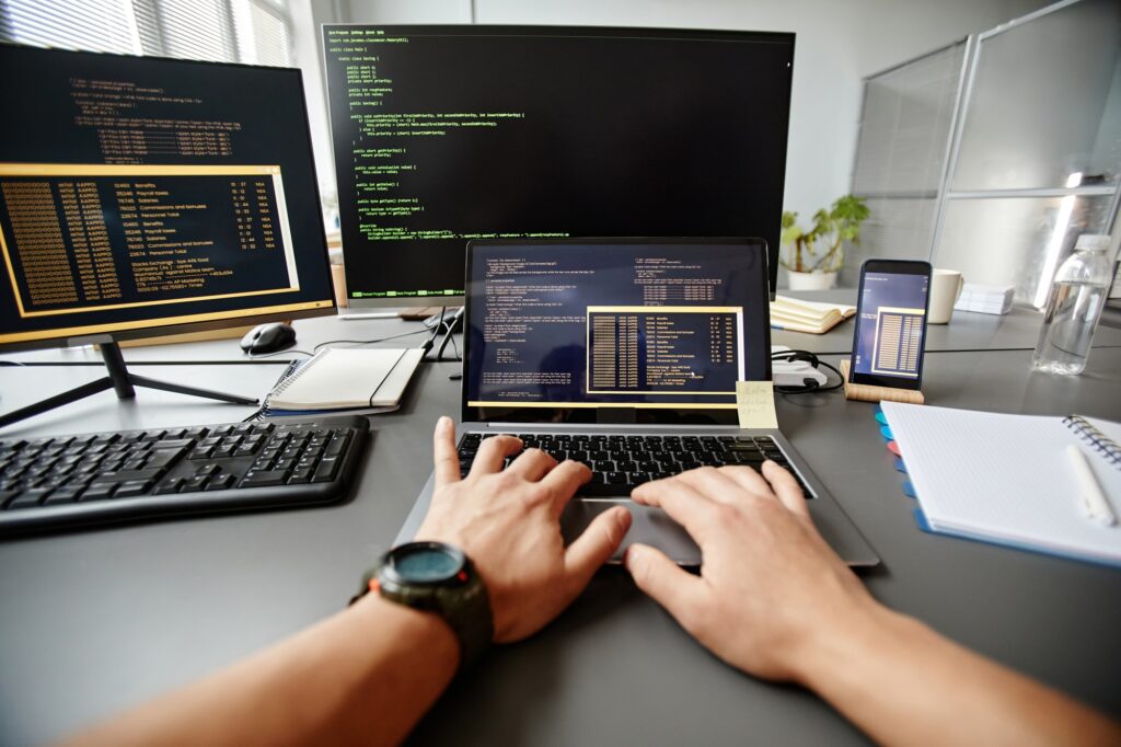 Programmer Writing Code POV