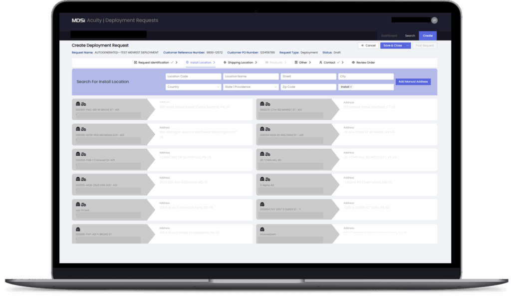 A laptop screen displays a web application form titled "Create Deployment Request," featuring search fields and address selection options.